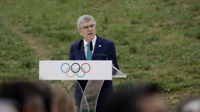 Rights groups implore IOC president to help get rid of hijab ban