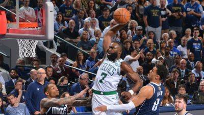 Celtics-Mavs: Best photos from Jaylen Brown's one-handed poster - ESPN