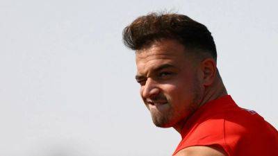 Shaqiri ready to spark Swiss, says not here for vacation