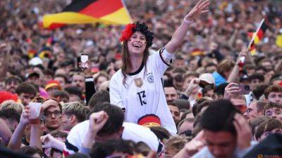 Berlin fan zone reaches capacity amid Euro fever - channelnewsasia.com - Germany - Scotland