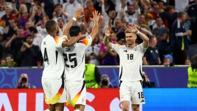 Hosts Germany crush 10-man Scotland 5-1 in Euro 2024 opener