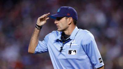 MLB disciplines umpire for allegedly violating league's gambling policy; punishment appealed: report