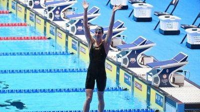 Ledecky punches ticket to Paris Games, Walsh sets world record in Indy