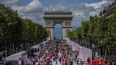 ‘The time of the whole car city is over’: How is Paris encouraging walking and cycling?