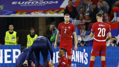 Jude Bellingham - Filip Kostic - Serbia fear Kostic sustained knee ligament damage, manager says - channelnewsasia.com - Britain - Germany - Denmark - Serbia - Slovenia
