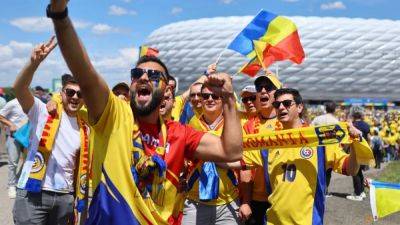 Free sunscreen as fans dodge heavy rain at Euro 2024