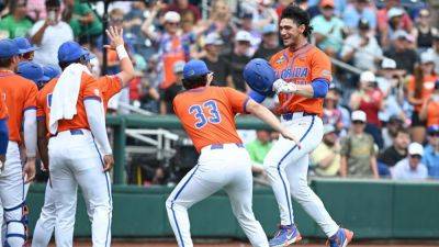 Jac Caglianone hits record HR, helps Florida move on in MCWS - ESPN