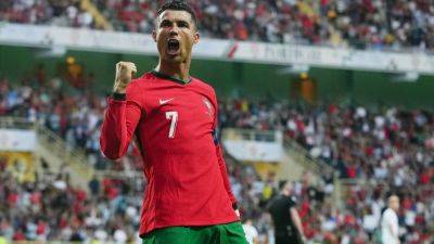 Cristiano Ronaldo in Portugal team on merit, insists Roberto Martinez