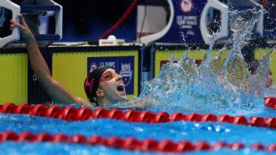 Regan Smith sets world record in 100m backstroke at U.S. swim trials - ESPN