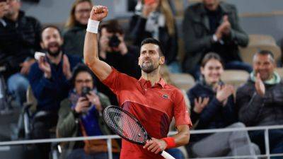 Roger Federer - Roland Garros - Jannik Sinner - Lorenzo Musetti - Novak Djokovic rallies for latest win in French Open history - ESPN - espn.com - France - Italy