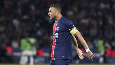 Kylian Mbappe puts pen to paper on Real Madrid deal