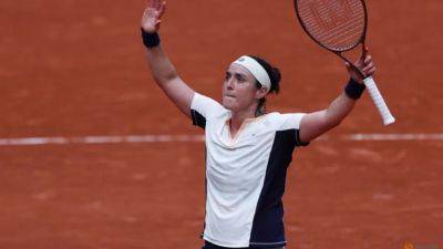 Jabeur ends Tauson's run to reach French Open quarters