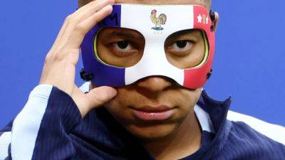 Didier Deschamps - Mbappe reveals personalised mask in French colours - channelnewsasia.com - France - Germany - Netherlands - Austria