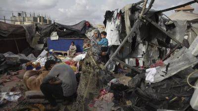 Israeli strikes on tent camps near Rafah kill at least 25 and wound 50