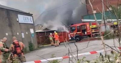 LIVE: Firefighters respond to huge building fire near town centre
