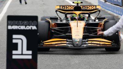 Lando Norris delivers best lap 'ever' after McLaren fire at Spanish GP - ESPN