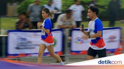 Potret Keseruan BTN Jakarta International Marathon 2024