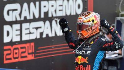 Max Verstappen fends off Lando Norris to reign in Spain