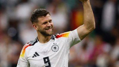 Fuellkrug's late header fills coffers for Germany team mates with 50,000 euro bonus