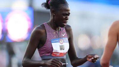 American runner won't defend Olympic title, officials reject her appeal after fall