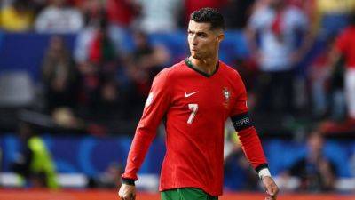 Ronaldo fans must stop pitch invasions, Portugal coach says - ESPN