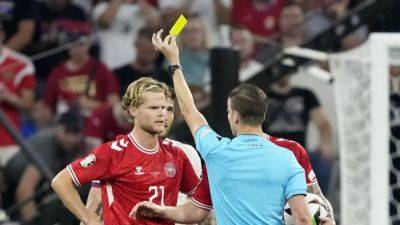 Denmark avoid yellow peril to claim second place in Group C