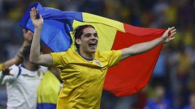 Romania end long wait with Hagi junior to the fore