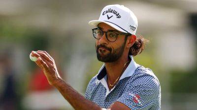 Akshay Bhatia rockets into lead in Detroit after big finish