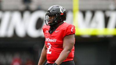 Cincinnati football star Dontay Corleone out indefinitely with blood clots - ESPN