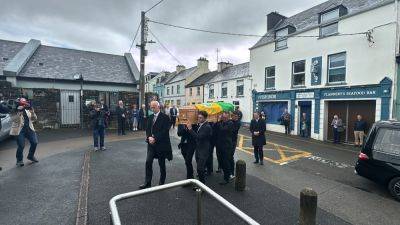 Funeral of Micheál Ó Muircheartaigh taking place in Kerry