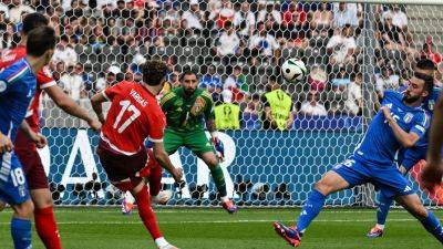 Swiss breeze past toothless Italy to make last eight