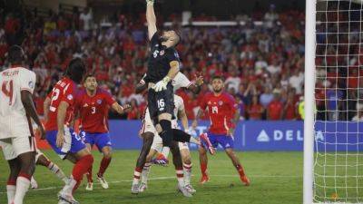 Canada into Copa America quarter-finals after 0-0 draw with 10-man Chile