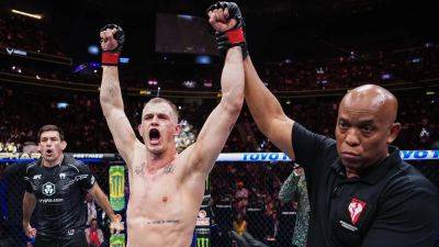 Ian Machado Garry extends unbeaten streak at UFC 303