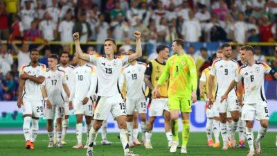 Germany weather storm to beat Denmark and reach quarters