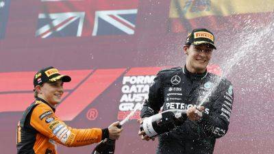 George Russell wins Austrian Grand Prix after Max Verstappen and Lando Norris collide to open the door