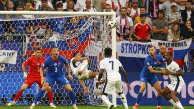 Jude Bellingham - Harry Kane - Phil Foden - Bellingham brilliance rescues England to book Euro 2024 quarter-final spot - channelnewsasia.com - Germany - Switzerland - Jordan - Slovakia