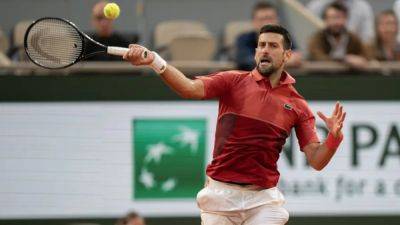 Roland Garros - Novak Djokovic - Casper Ruud - Lorenzo Musetti - Francisco Cerundolo - Djokovic pulls out of French Open with knee injury - channelnewsasia.com - France - Italy