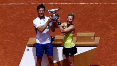 Siegemund and Roger-Vasselin win French Open mixed doubles title