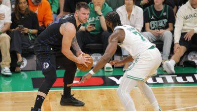 Mavericks' movement stymied by Celtics' defense in Game 1 loss - ESPN