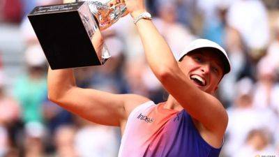 Queen of clay Swiatek rules again at Roland Garros