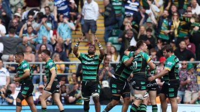 Northampton edge out 14-man Bath in thriller to win title