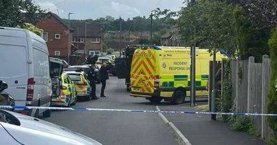 Armed police in standoff with 'man with handgun' as area cordoned off