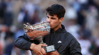 Alcaraz makes early entrance into all-court elite with French Open triumph