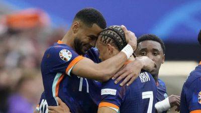 Virgil Van-Dijk - Cody Gakpo - Gakpo strike and Malen double help Dutch reach Euro quarter-finals - channelnewsasia.com - Germany - Netherlands - Romania - Austria - Turkey