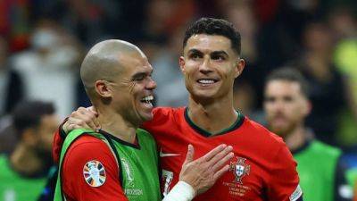 Cristiano Ronaldo - Diogo Costa - Reaction from Portugal's shootout win over Slovenia at Euro 2024 - channelnewsasia.com - France - Germany - Portugal - Slovenia