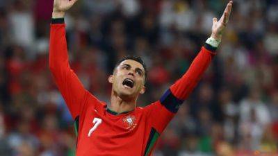 Cristiano Ronaldo - Fernando Santos - Roberto Martínez - Ballon D - Tearful Ronaldo a frustrated great battling with Father Time - channelnewsasia.com - Qatar - Portugal - Morocco - Slovenia - Saudi Arabia