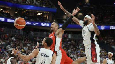 Anthony Davis - Dawn Staley - Carmelo Anthony - Mike Krzyzewski - Paris Olympics - Barack Obama - U.S. tops Canada in Olympic men's basketball exhibition - cbc.ca - France - Usa - Canada - county Dillon - county Brooks