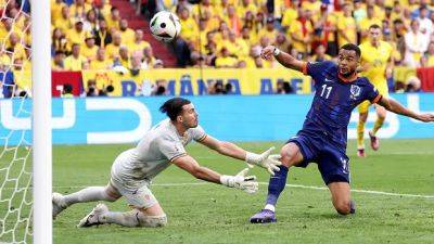 Virgil Van-Dijk - Cody Gakpo - Stefan De-Vrij - Ivan Schranz - Bart Verbruggen - Georges Mikautadze - Netherlands into Euro quarterfinals on strength of Gakpo, Malen efforts vs. Romania - cbc.ca - Germany - Netherlands - Romania - Austria - Georgia - Turkey - Slovakia