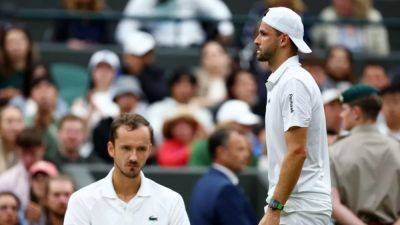 Grigor Dimitrov - Dimitrov injury sends Medvedev through to Wimbledon quarter-finals - channelnewsasia.com - Russia - Italy - Bulgaria