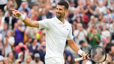 Novak Djokovic eases knee concerns, wins opener at Wimbledon - ESPN